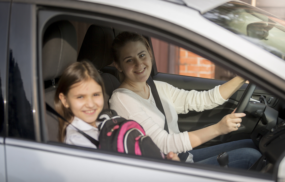 Child riding in a car with a parent